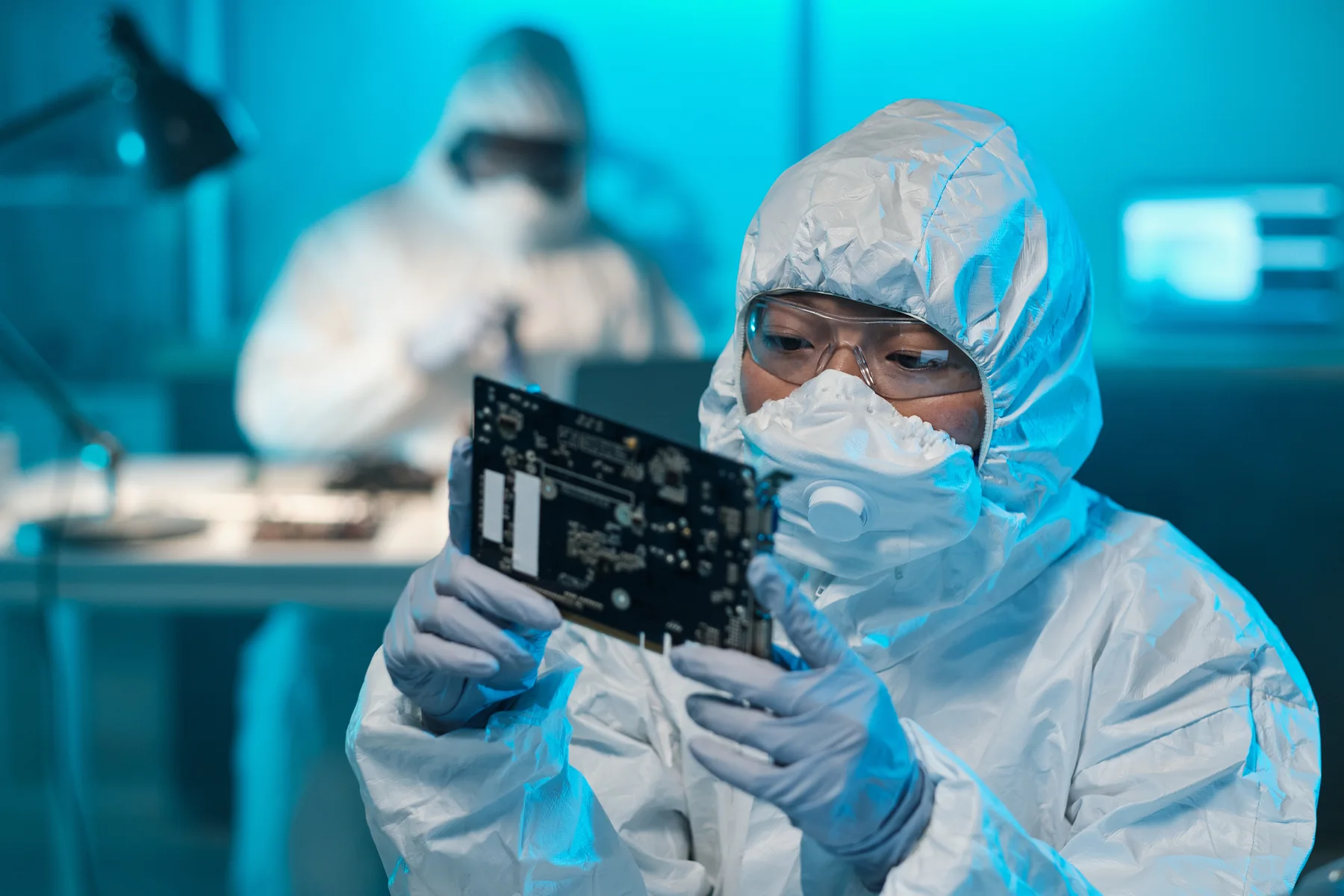 High-tech manufacturing people and equipment